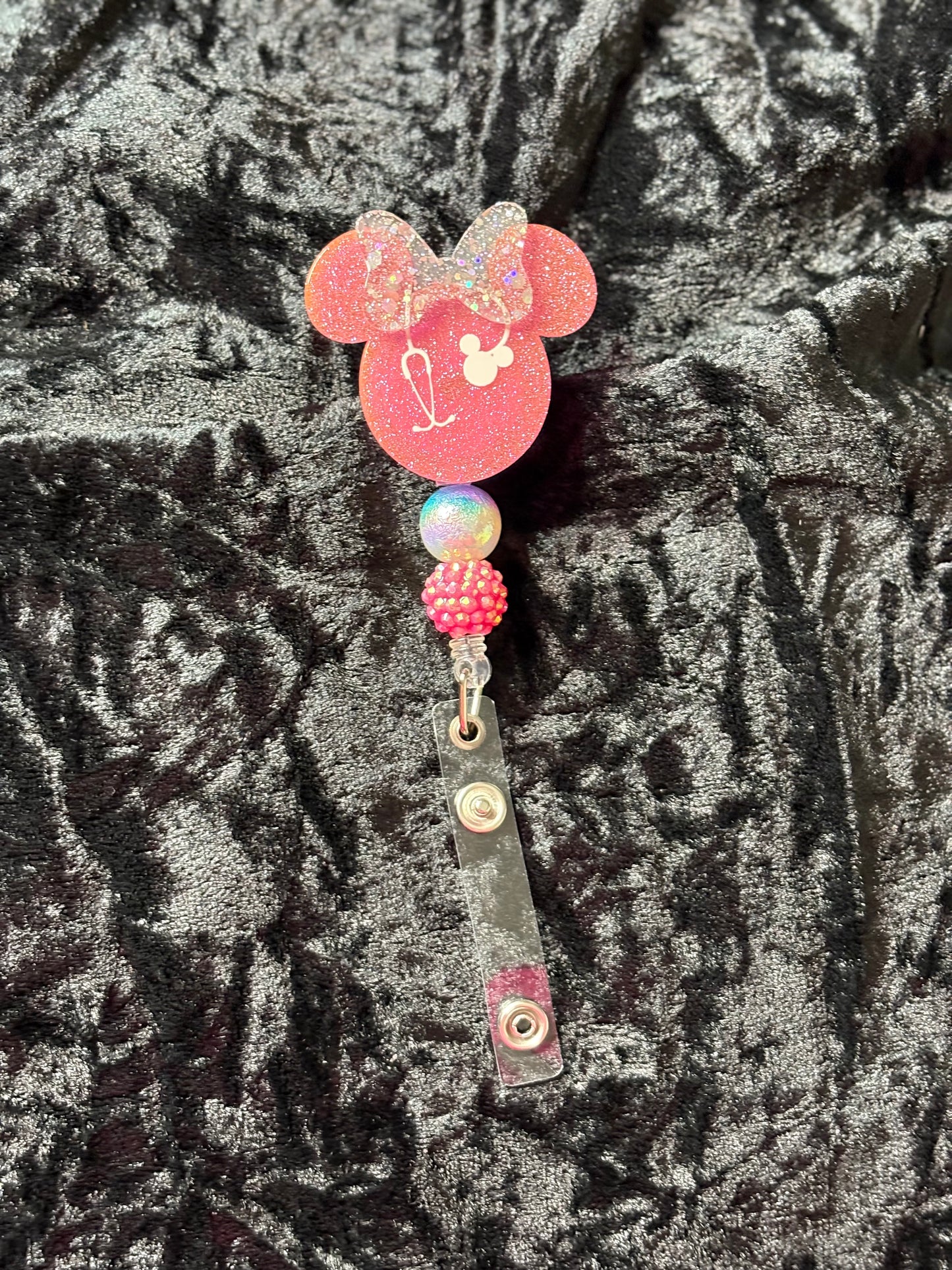 Pink Mouse with bow badge reels
