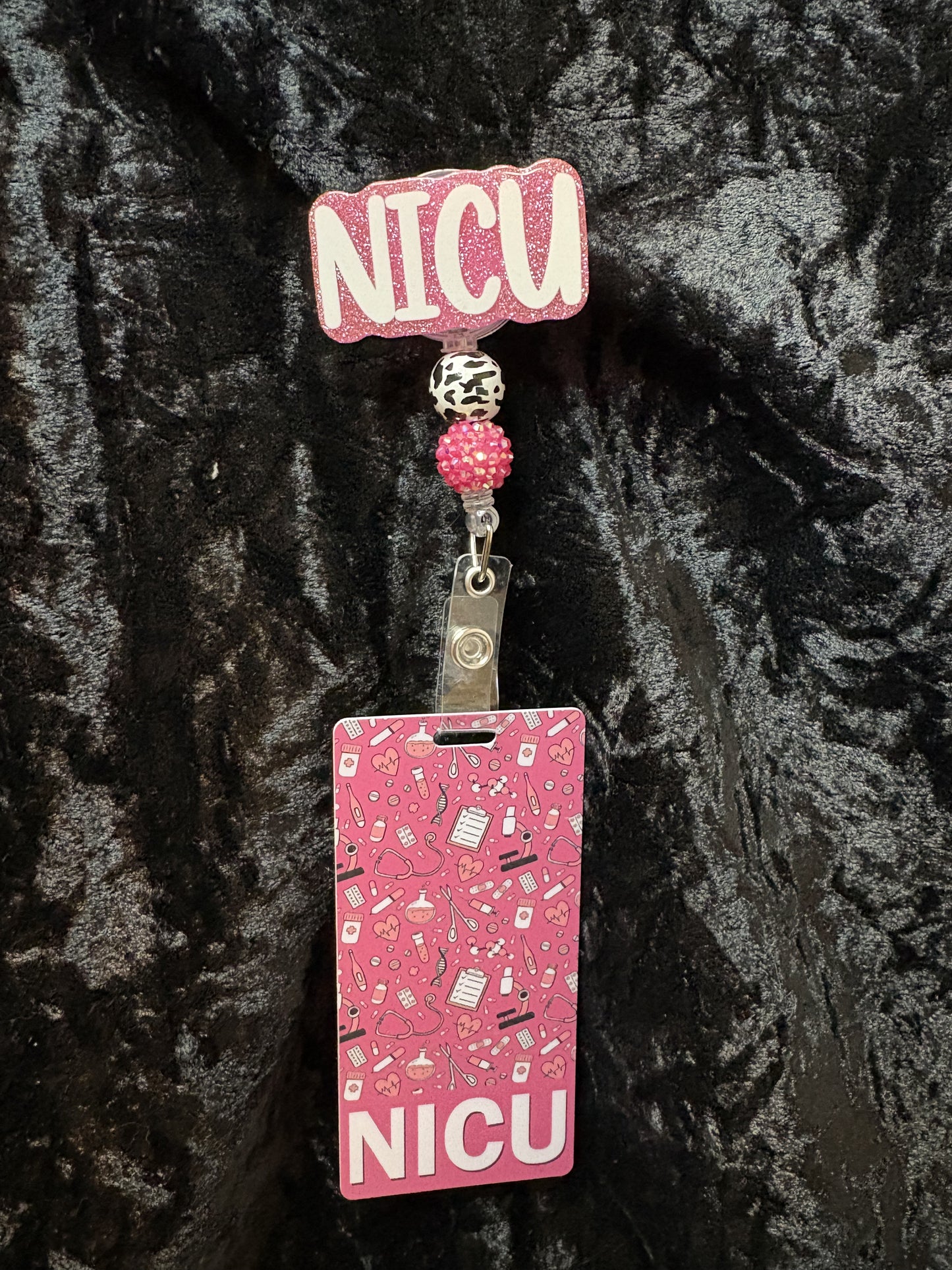 Pink Badge Reel with ID card.