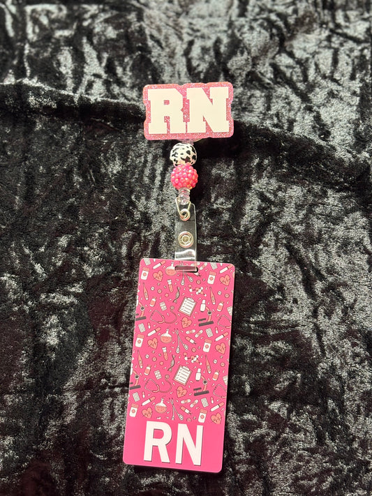 Pink Badge Reel with ID card.