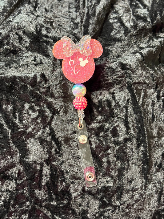 Pink Mouse with bow badge reels