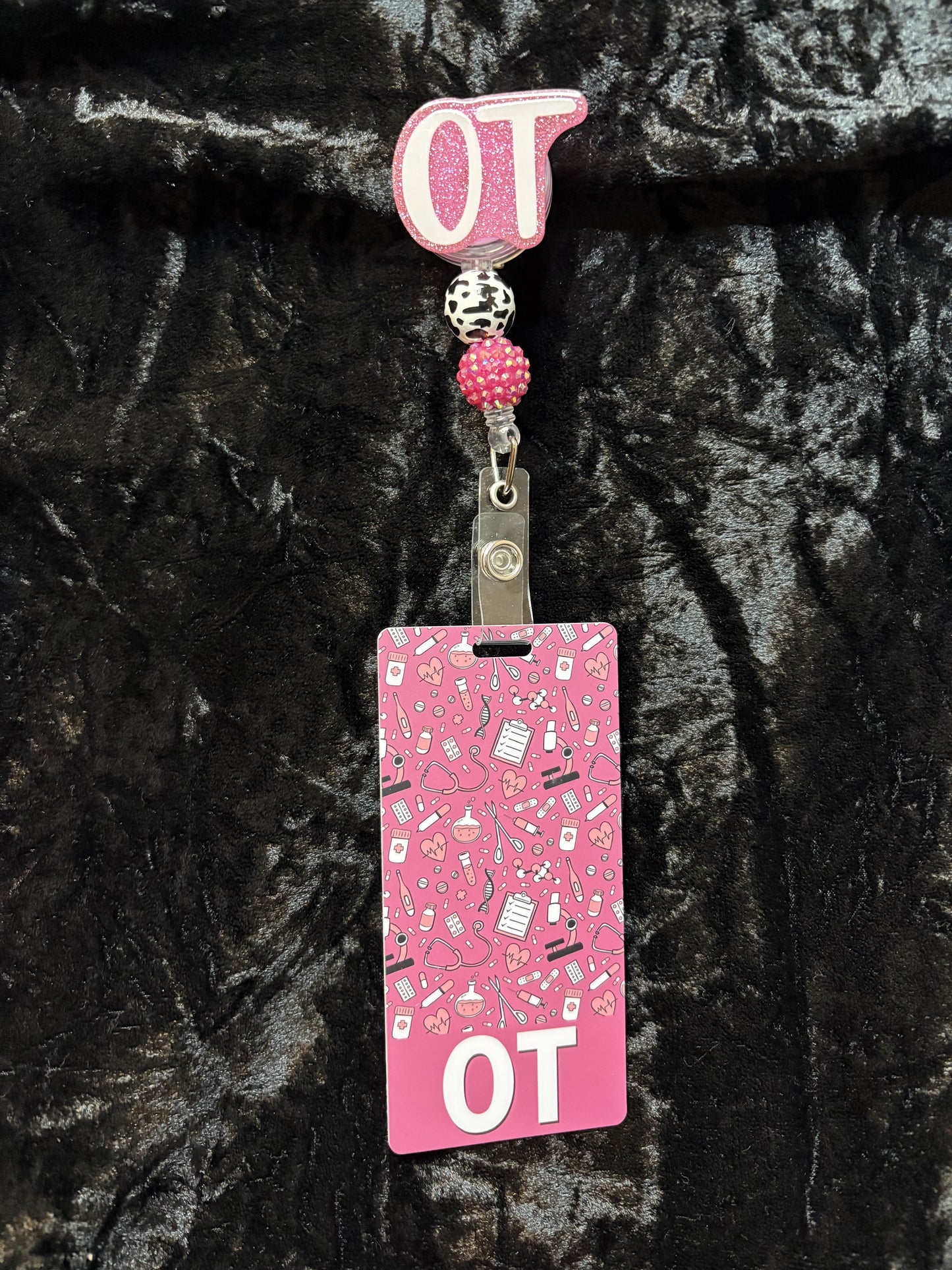 Pink Badge Reel with ID card.